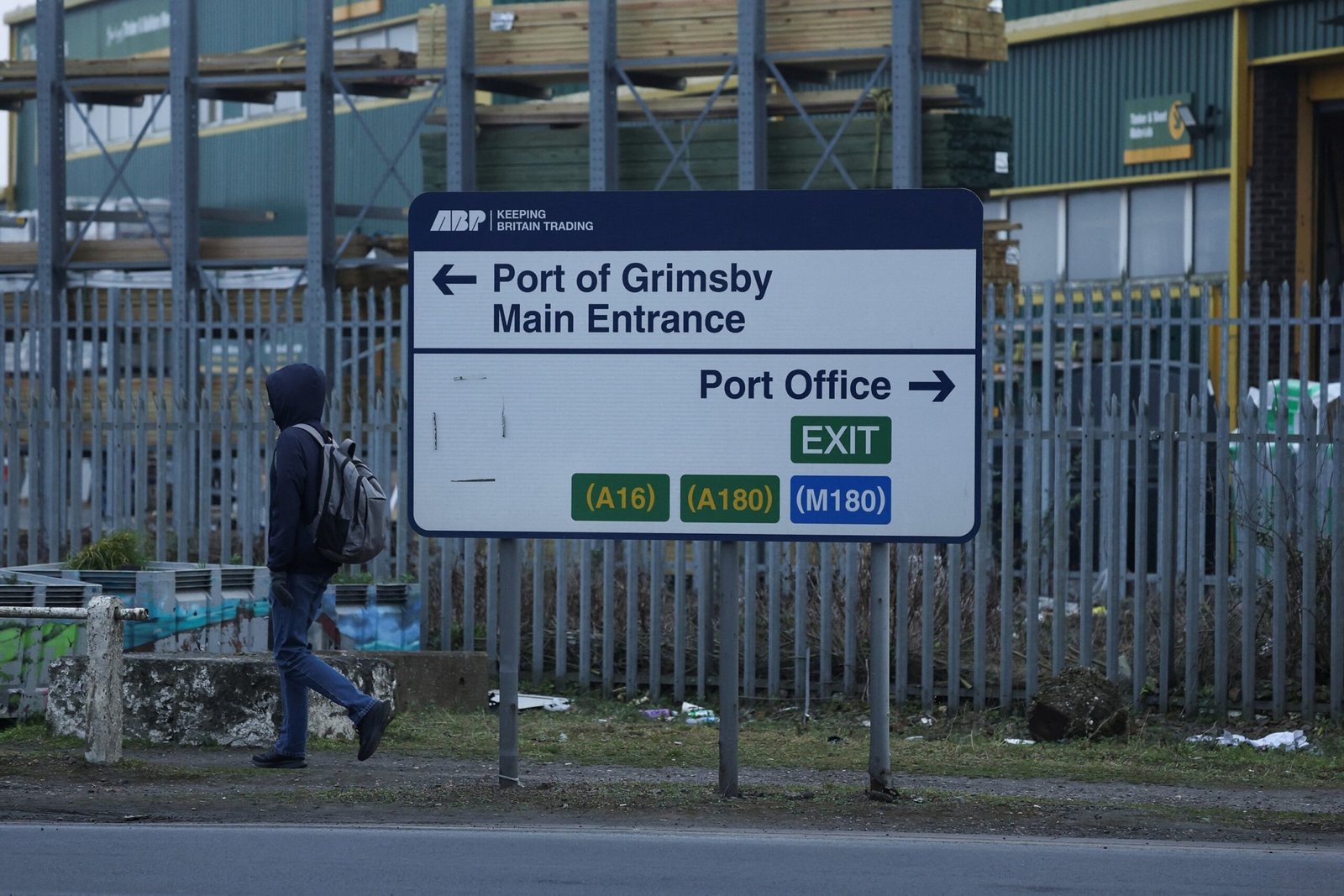 Photo: A person walks on a sign for the port of Grimsby, after a fuel oil tanker, operated by the American company Crowley and owned by Stena, and a container container called Solong collided on the coast of the Northeast of England, in Grimsby, Great Britain, March 10, 2025.