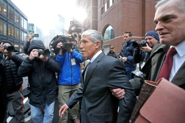 The master mind of the Varsity Blues William Rick Singer, Centro, leaves the Moakley Justice Palace after being sentenced to 3.5 years in prison on January 4, 2023 in Boston, Mass.